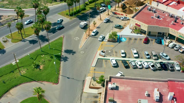 SAN JOSE DEL CABO BCS MEXICO-2021: Overhead View of Street and Parking Lot with Moving Vehicles
