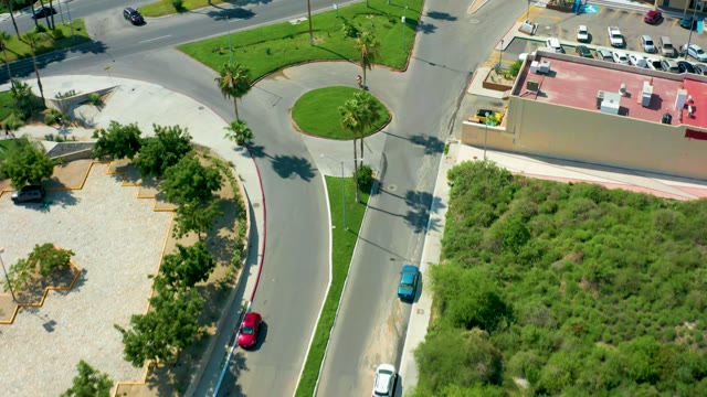 SAN JOSE DEL CABO BCS MEXICO-2021: Vehicles Moving on Curved Road and Parking Lot