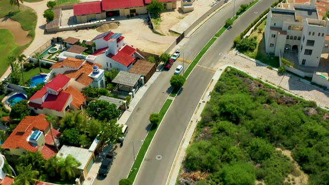 SAN JOSE DEL CABO BCS MEXICO-2021: Car Driving on a Residential Road