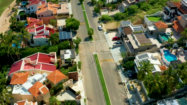 SAN JOSE DEL CABO BCS MEXICO-2021: Residential Neighborhood with Moving Car and Ascending Camera