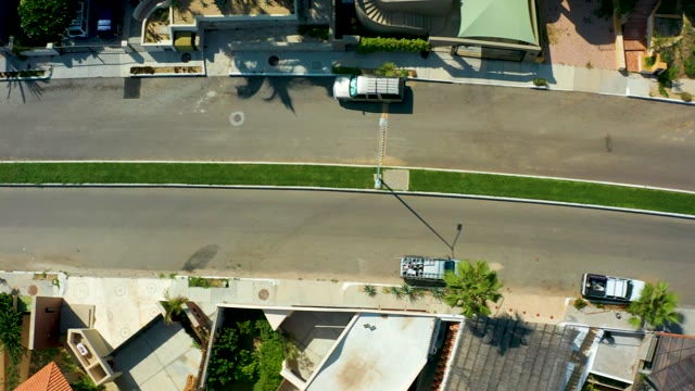 SAN JOSE DEL CABO BCS MEXICO-2021: White Van Driving on Residential Street