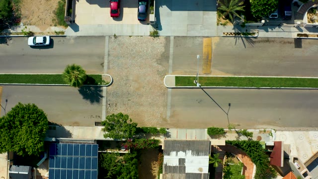 SAN JOSE DEL CABO BCS MEXICO-2021: Floodwater Spreading Across Residential Street Intersection