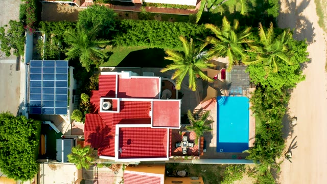 SAN JOSE DEL CABO BCS MEXICO-2021: Person Adjusting Pool Cover at Residential Property