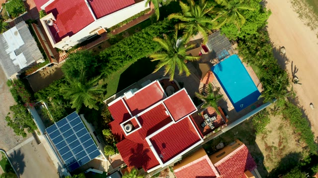 SAN JOSE DEL CABO BCS MEXICO-2021: Red Roofed Houses and Palm Trees in Residential Area
