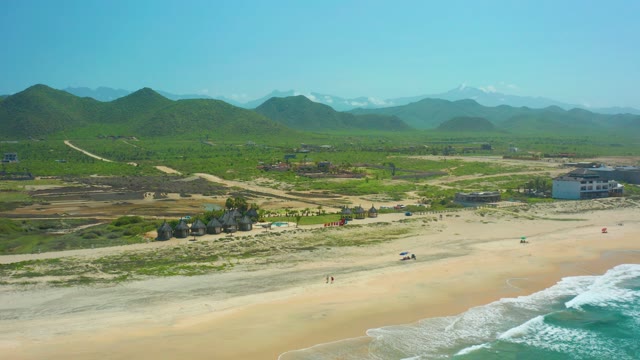 CERRITOS BEACH BCS MEXICO-2021: Sandy Beach with Ocean Waves and Mountain Backdrop