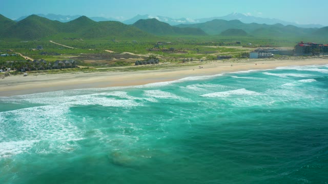 CERRITOS BEACH BCS MEXICO-2021: Beach and Ocean Waves with Mountain Backdrop