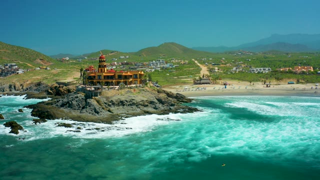 CERRITOS BEACH BCS MEXICO-2021: Lighthouse on Rocky Coast with Rotating Light