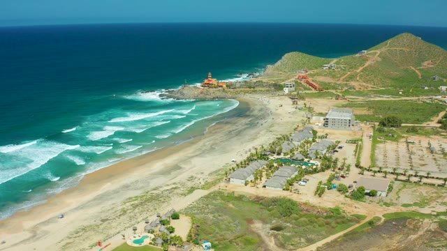 CERRITOS BEACH BCS MEXICO-2021: Coastal Beach with Ocean Waves and Buildings