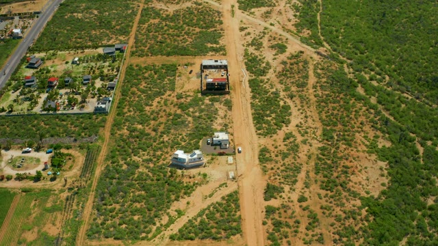 CERRITOS BEACH BCS MEXICO-2021: Car Driving Away From Rural Property
