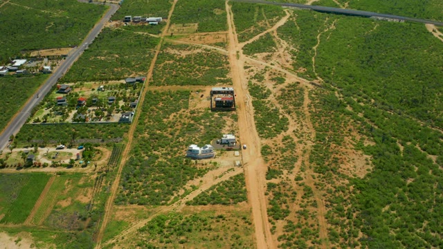 CERRITOS BEACH BCS MEXICO-2021: Vehicle Moving on Paved Road in Rural Landscape