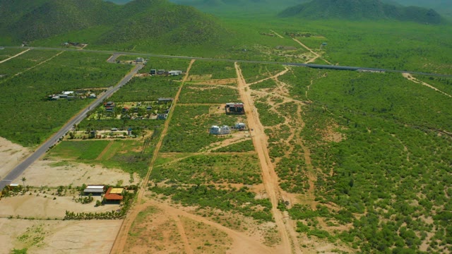 CERRITOS BEACH BCS MEXICO-2021: Rural Roads and Small Structures in Green Landscape