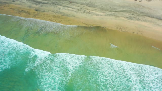 CERRITOS BEACH BCS MEXICO-2021: Surfer Riding Ocean Wave From Aerial View