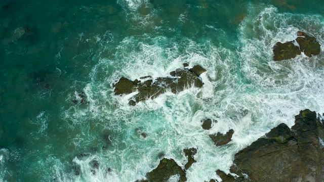 CERRITOS BEACH BCS MEXICO-2021: Waves Crashing Against Rocky Shoreline