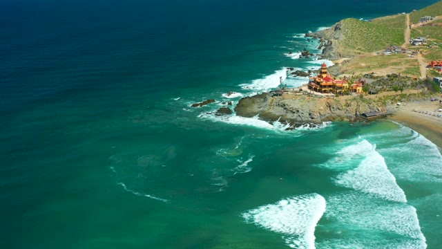 CERRITOS BEACH BCS MEXICO-2021: Waves Crashing on Rocky Shore near Coastal Structure