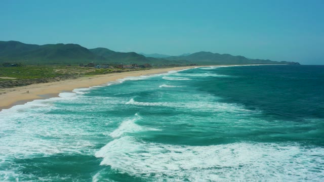 CERRITOS BEACH BCS MEXICO-2021: Waves Rolling Toward Sandy Shoreline
