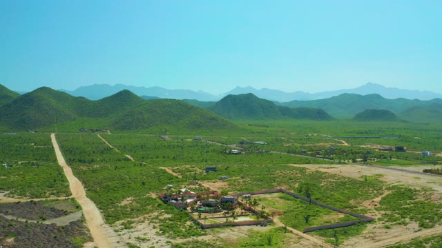 CERRITOS BEACH BCS MEXICO-2021: Rural Landscape with Dirt Road and Green Hills