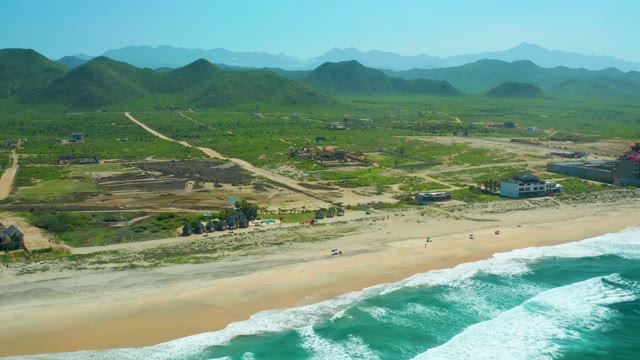 CERRITOS BEACH BCS MEXICO-2021: Sandy Beach and Turquoise Ocean Waves with Green Hills