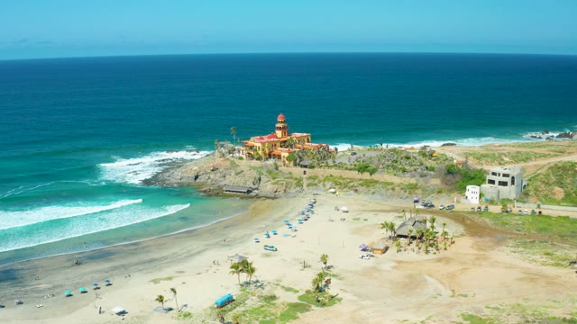 CERRITOS BEACH BCS MEXICO-2021: Beachgoers Moving Near Lighthouse and Ocean