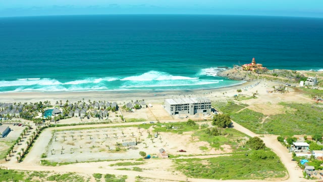 CERRITOS BEACH BCS MEXICO-2021: Shifting Tents and Ocean Waves at Coastal Development Site