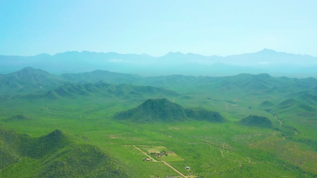 CERRITOS BEACH BCS MEXICO-2021: Aerial Pan of Lush Valley and Rolling Hills