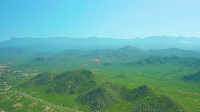 CERRITOS BEACH BCS MEXICO-2021: Green Hills and Winding Road in Mountain Valley