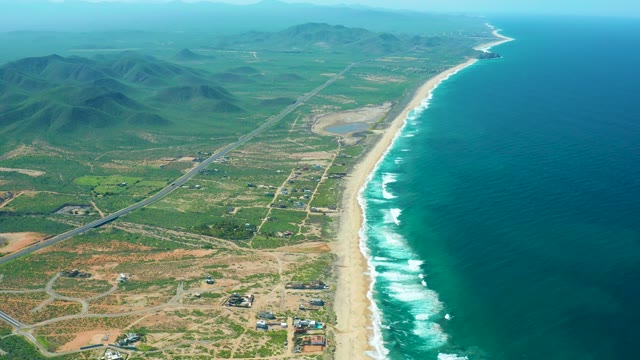 CERRITOS BEACH BCS MEXICO-2021: Coastal Road with Moving Vehicle and Beach