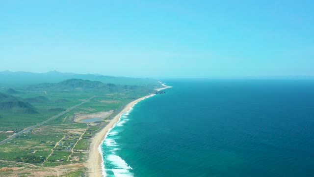 CERRITOS BEACH BCS MEXICO-2021: Gentle Ocean Waves Along Sandy Coastal Shore