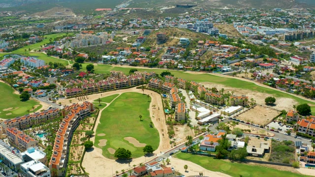 SAN JOSE DEL CABO BCS MEXICO-2021: Golf Course with Person Moving on Green
