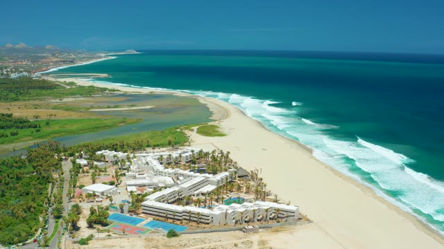 SAN JOSE DEL CABO BCS MEXICO-2021: Lagoon and Ocean Waves Along Sandy Shore