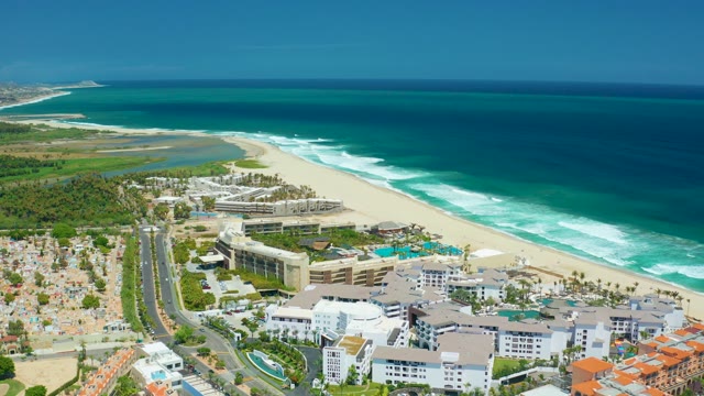 SAN JOSE DEL CABO BCS MEXICO-2021: Coastal Resort with Ocean Waves and Road Traffic
