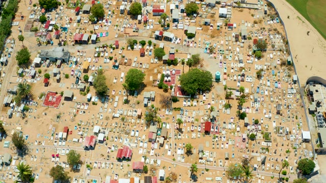 SAN JOSE DEL CABO BCS MEXICO-2021: Temporary Campsite with Tents and Scattered Trees