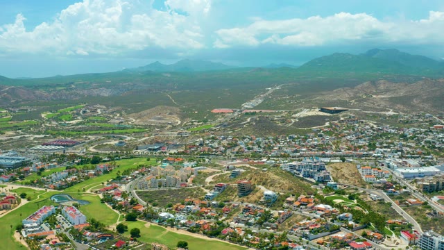 SAN JOSE DEL CABO BCS MEXICO-2021: Clouds Drifting Over Residential Area and Golf Course
