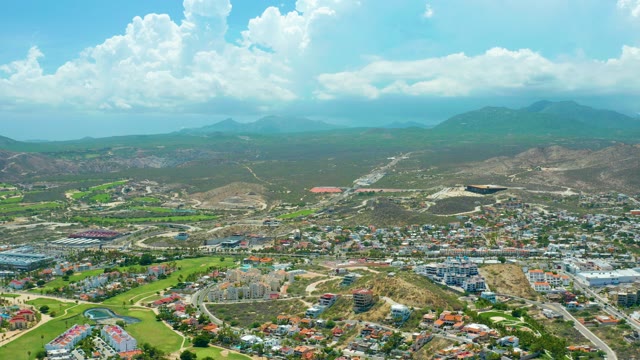 SAN JOSE DEL CABO BCS MEXICO-2021: Clouds Drifting Over Mountain Townscape