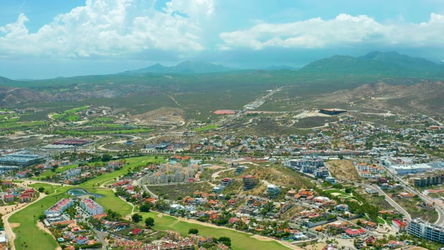 SAN JOSE DEL CABO BCS MEXICO-2021: Golf Course and Town with Shifting Clouds