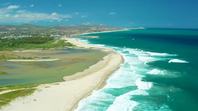 SAN JOSE DEL CABO BCS MEXICO-2021: Coastal Shoreline with Turquoise Waves and Sandy Beach