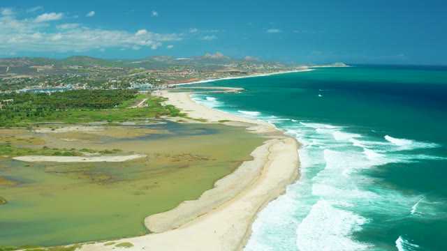 SAN JOSE DEL CABO BCS MEXICO-2021: Ocean Waves Rolling Onto Sandy Coastline