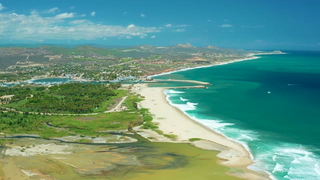 SAN JOSE DEL CABO BCS MEXICO-2021: Gentle Ocean Waves Along Sandy Shoreline
