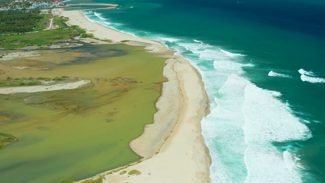 SAN JOSE DEL CABO BCS MEXICO-2021: Coastal Lagoon and Ocean Waves Along Sandy Shore