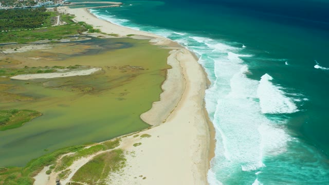SAN JOSE DEL CABO BCS MEXICO-2021: Sandy Beach and Ocean Waves with Marsh