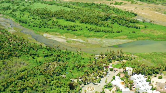 SAN JOSE DEL CABO BCS MEXICO-2021: Riverside Resort and Flowing River in Lush Landscape