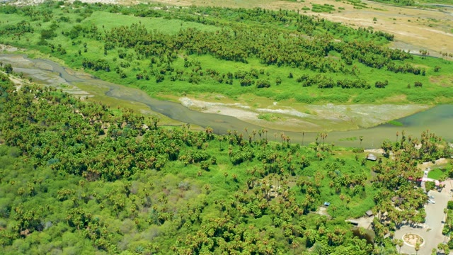 SAN JOSE DEL CABO BCS MEXICO-2021: Flowing River Through Lush Green Fields