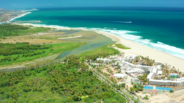 SAN JOSE DEL CABO BCS MEXICO-2021: Coastal Scene with Boat Moving in Ocean