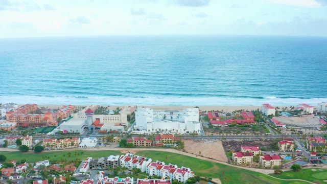 SAN JOSE DEL CABO BCS MEXICO-2021: Resort Buildings Along Ocean Shoreline