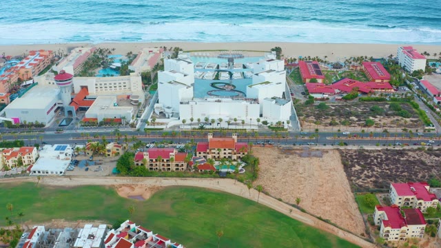 SAN JOSE DEL CABO BCS MEXICO-2021: Coastal Resort and Road with Shifting Pool and Traffic