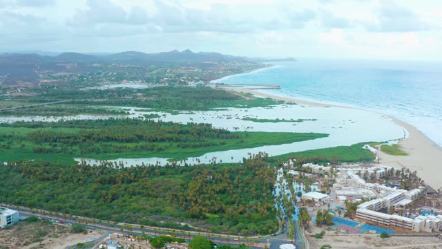 SAN JOSE DEL CABO BCS MEXICO-2021: Lagoon Water Level Fluctuating by Coast