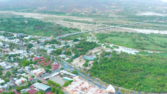 SAN JOSE DEL CABO BCS MEXICO-2021: Town and River with Gradually Clearing Sky