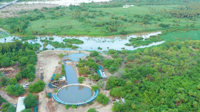 SAN JOSE DEL CABO BCS MEXICO-2021: Water Treatment Plant Beside River and Greenery