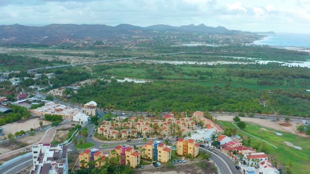 SAN JOSE DEL CABO BCS MEXICO-2021: Residential Neighborhood and Lush Fields with Distant Mountains