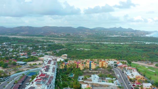 SAN JOSE DEL CABO BCS MEXICO-2021: Aerial Pan of Residential Area and Hills