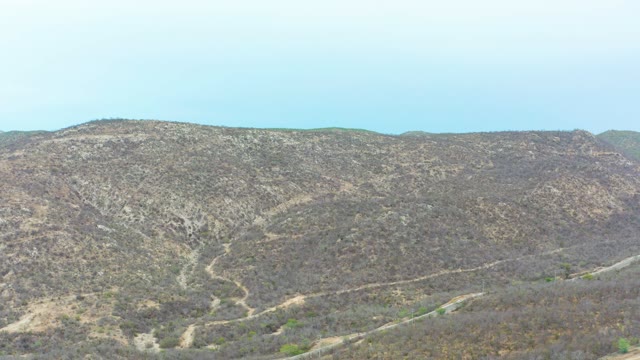 LA PLAYITA LOS CABOS MEXICO-2021: Vehicle Traveling on Winding Mountain Road